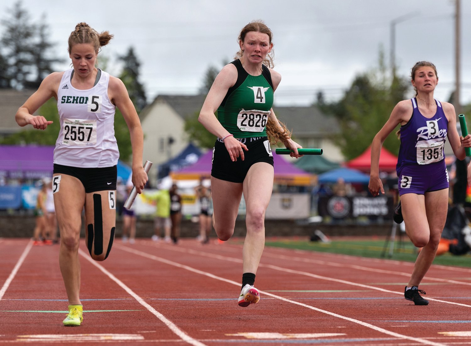 Tumwater's Alyssa Duncan races past the finish line in a 2A Girls 4x100 Prelim at the 4A/3A/2A State Track and Field Championships on Friday, May 27, 2022, at Mount Tahoma High School in Tacoma. (Joshua Hart/For The Chronicle)